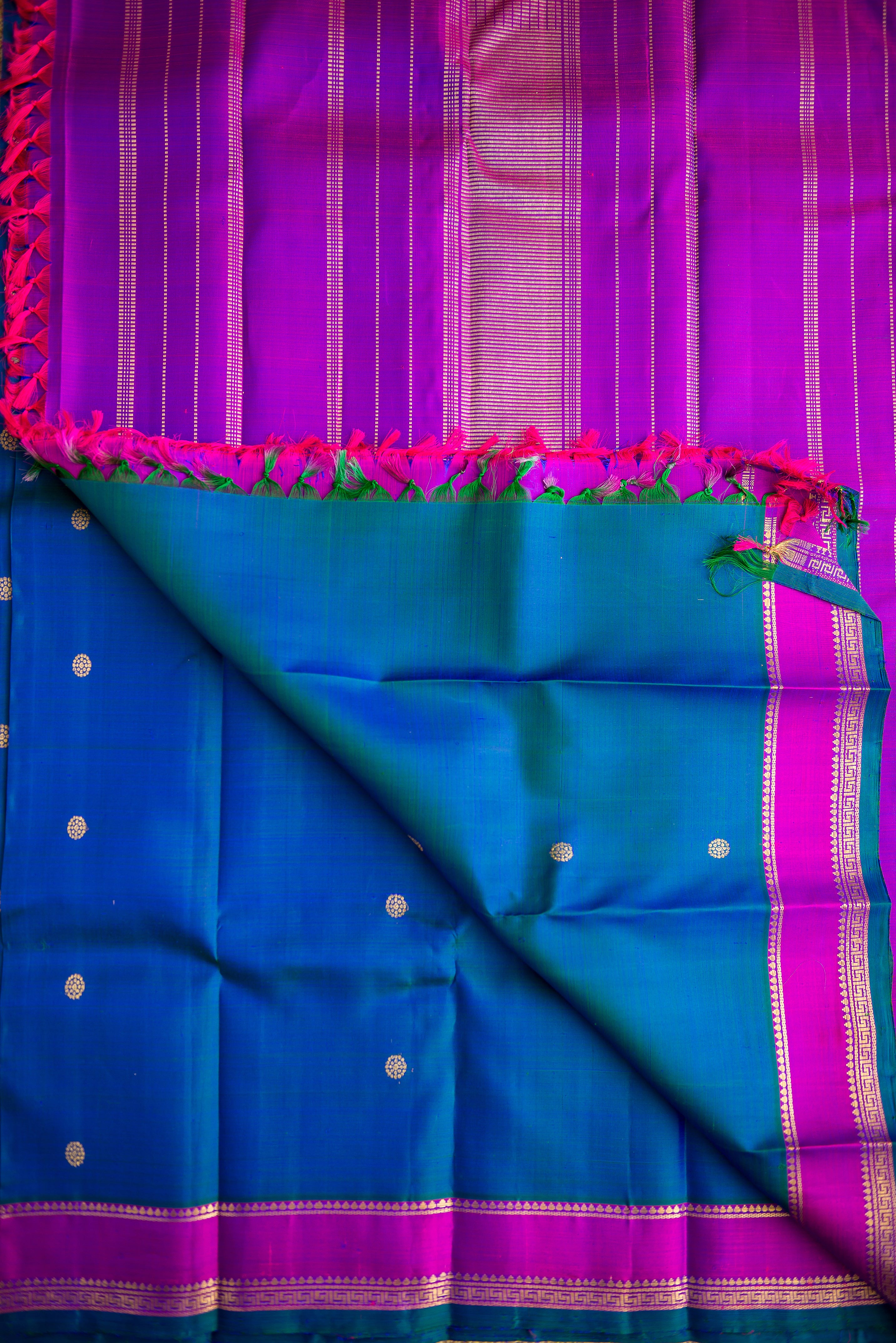 Blue-Teal Kanchipuram Silk Saree with a Bright Magenta Border