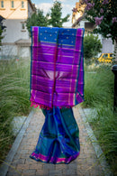 Blue-Teal Kanchipuram Silk Saree with a Bright Magenta Border