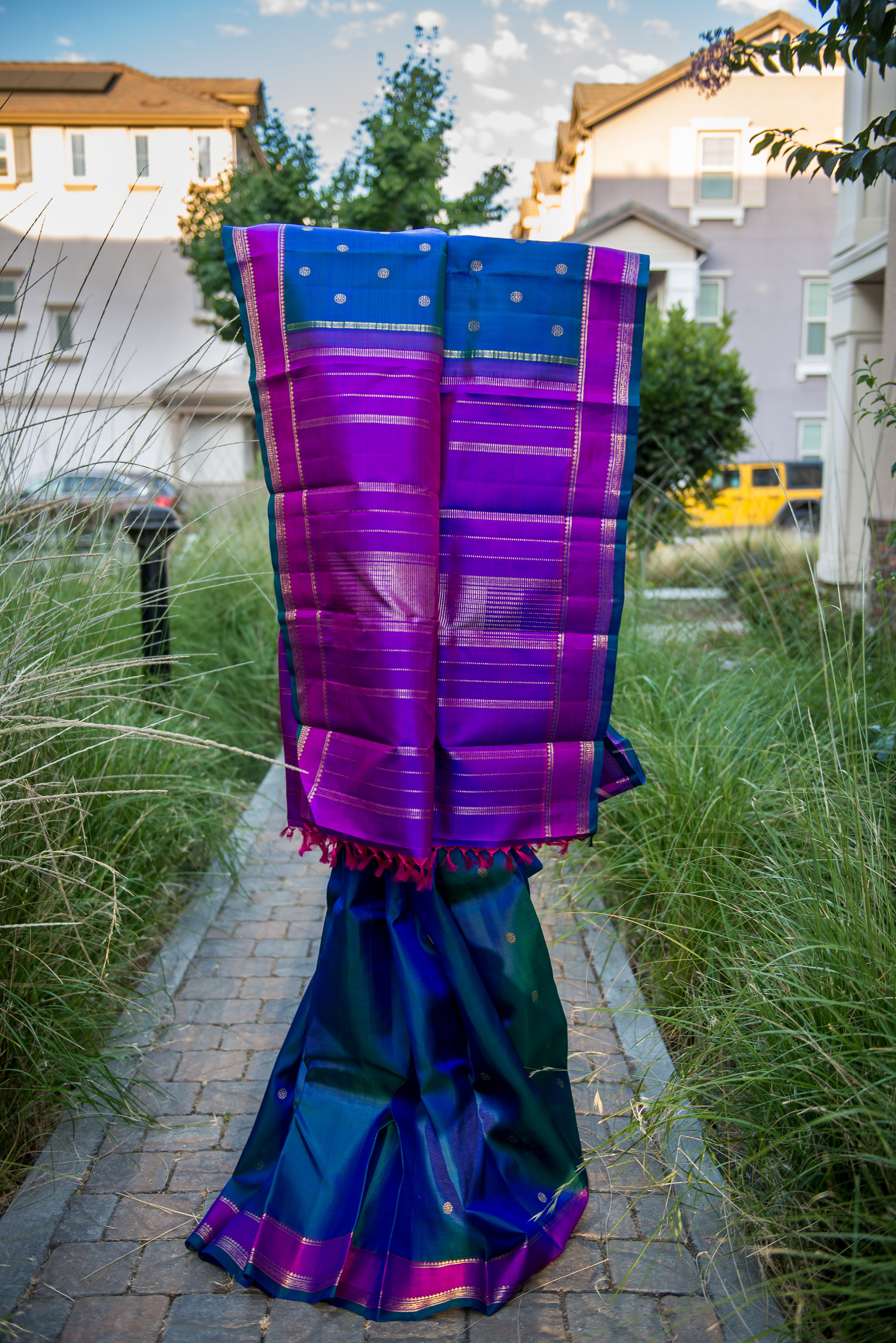 Blue-Teal Kanchipuram Silk Saree with a Bright Magenta Border