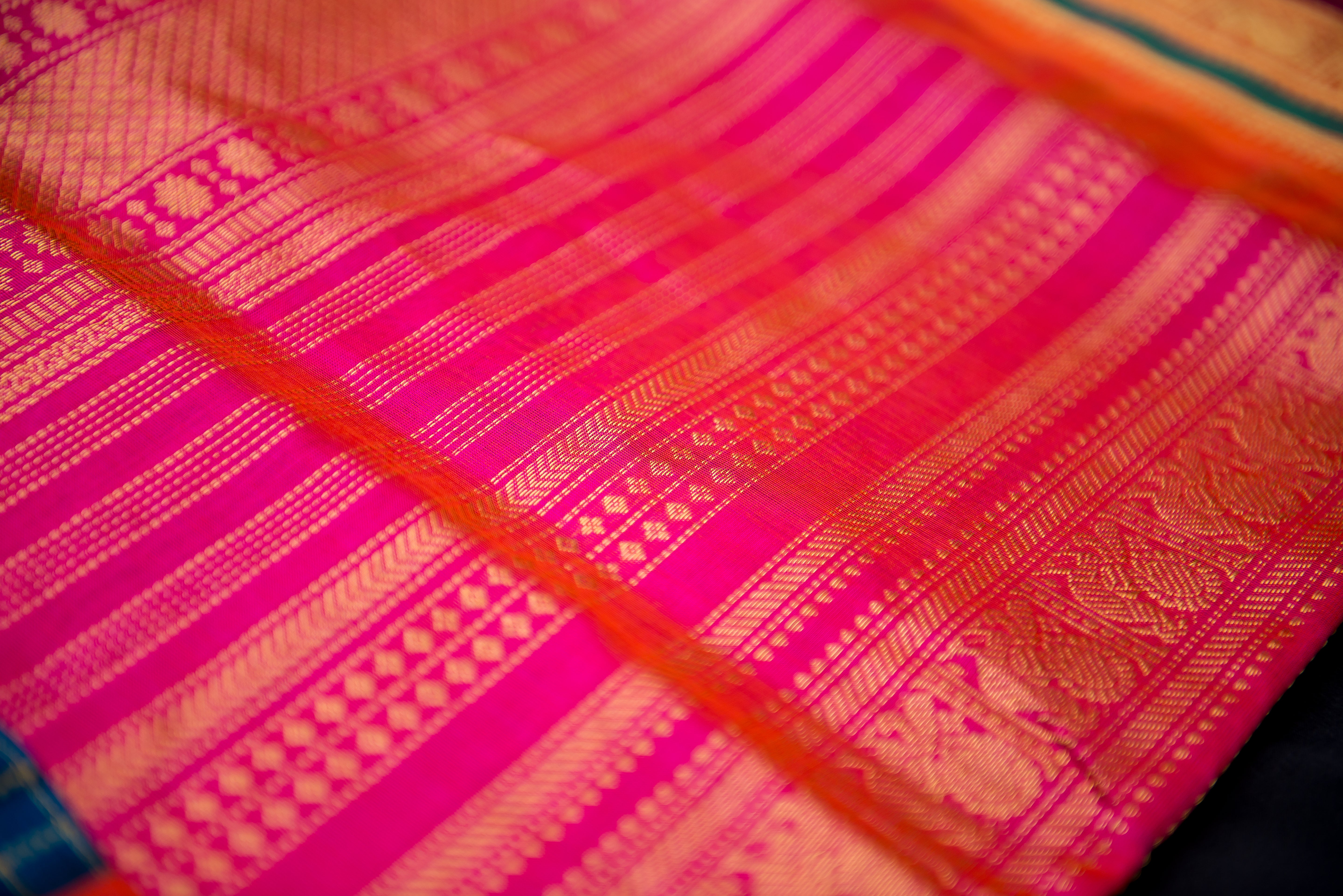 Peacock Blue Handwoven Silk Cotton Saree with Pink Pallu