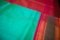 Vibrant Handloom Teal Silk Cotton Saree with Shocking Pink Pallu
