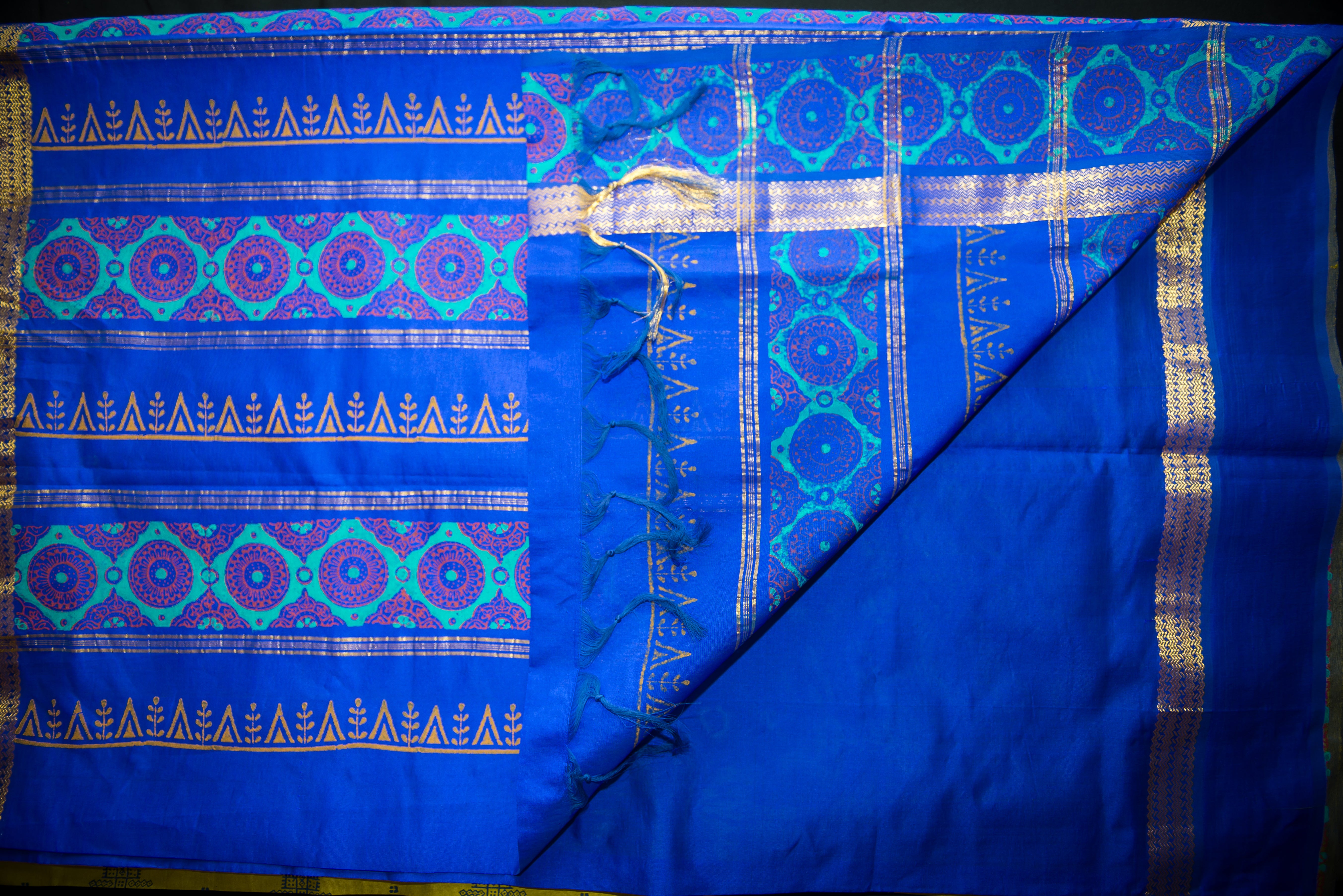 Vibrant Olive Green Silk Cotton Saree with a Deep Blue Artistic Pallu