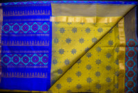 Vibrant Olive Green Silk Cotton Saree with a Deep Blue Artistic Pallu
