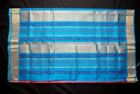 Pink-Red Silk Cotton Blockprint Saree with a Bright Blue Pallu