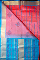 Pink-Red Silk Cotton Blockprint Saree with a Bright Blue Pallu