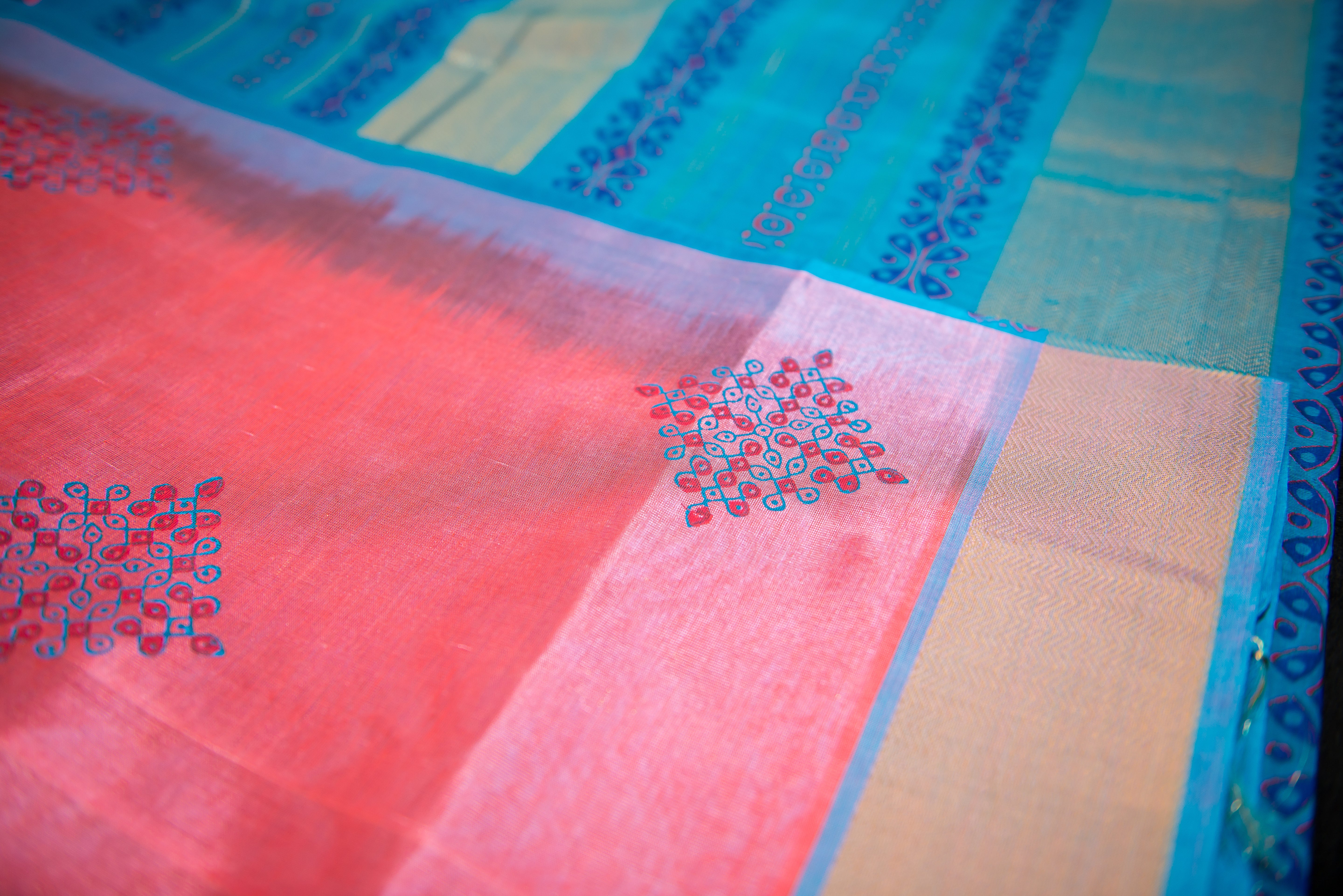 Pink-Red Silk Cotton Blockprint Saree with a Bright Blue Pallu