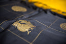 Bold Golden-Yellow Pure Silk Saree with a Black and Gold Pallu