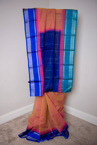 Peach Silk Cotton Saree with Royal Blue Pallu and Ganga-Jamuna Border