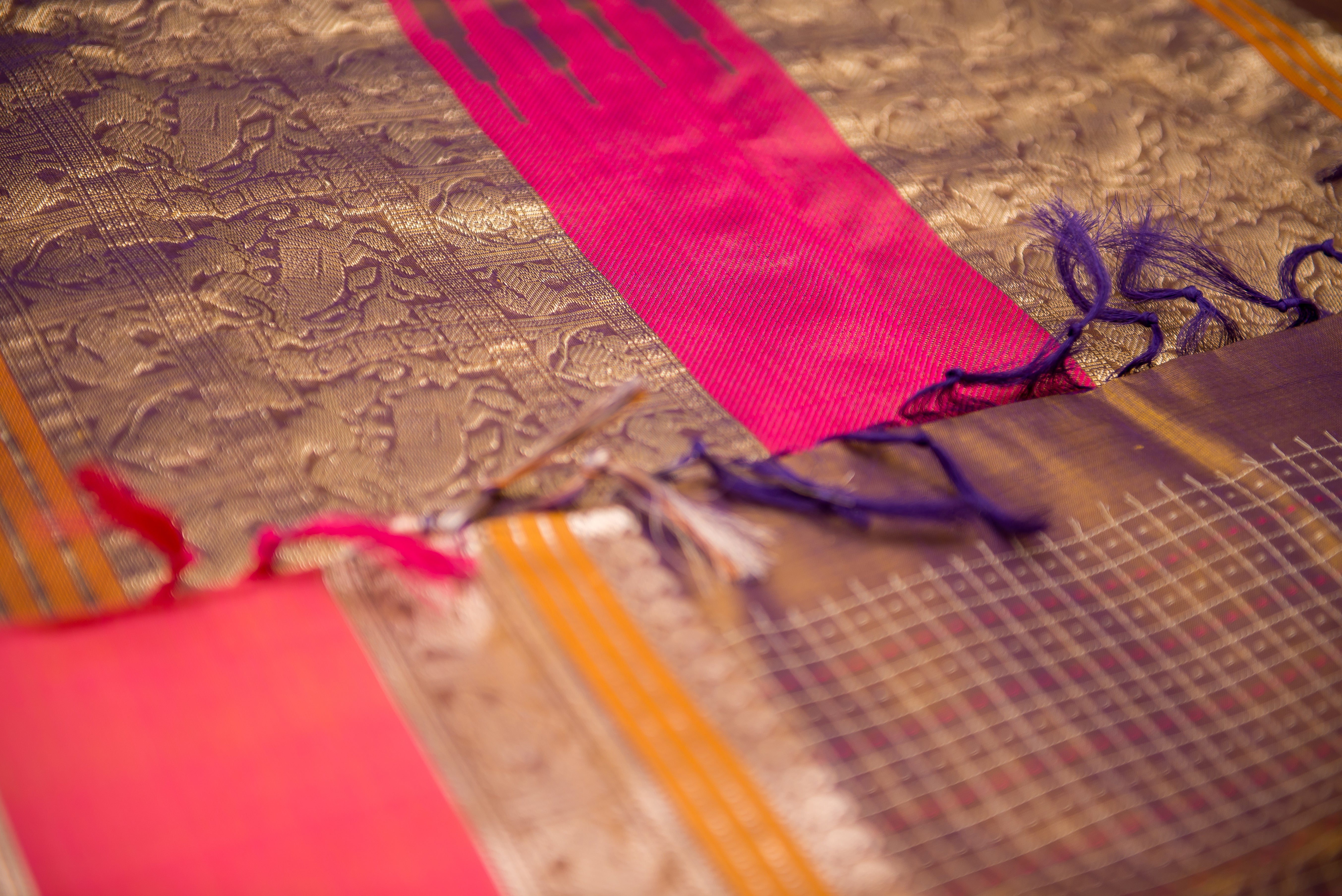 Dark Brown Kanchipuram Silk Cotton Saree with a Pink and Gold Border
