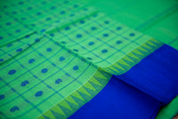 Fresh Green Silk Cotton Saree with Royal Blue Anams and Rudrakshams