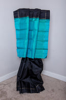 Black Kanchipuram Silk Saree with a Contrast Turquoise Blue Pallu